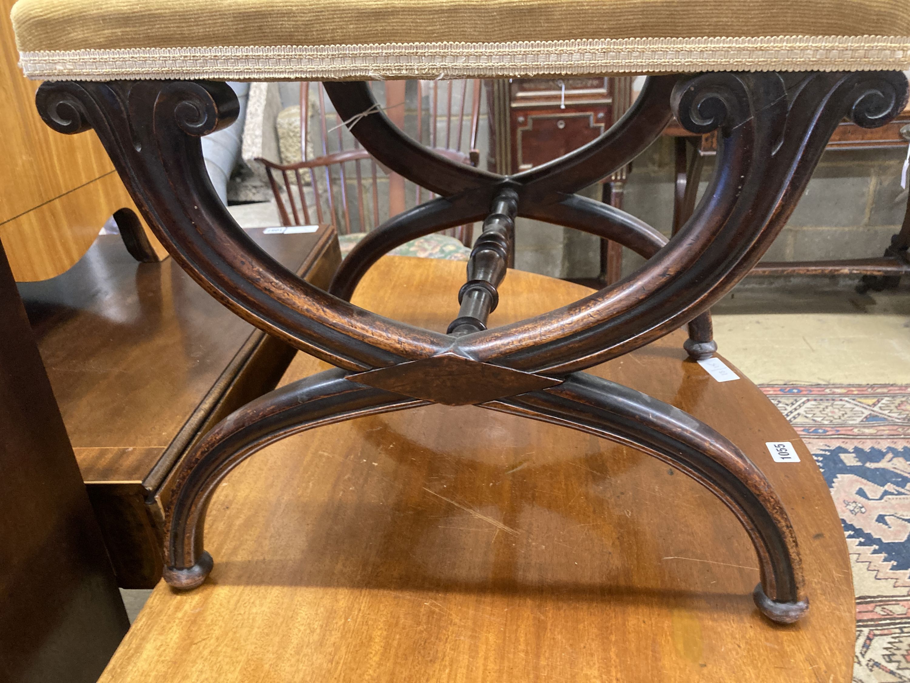 An early Victorian mahogany X frame dressing stool, length 45cm, depth 42cm, height 41cm